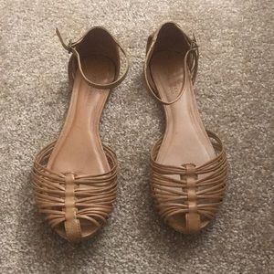 Covered toe brown woven sandals